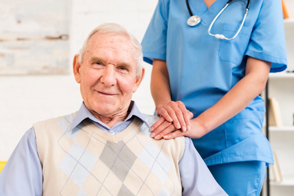 caregiver-holding-old-man-s-shoulder-1
